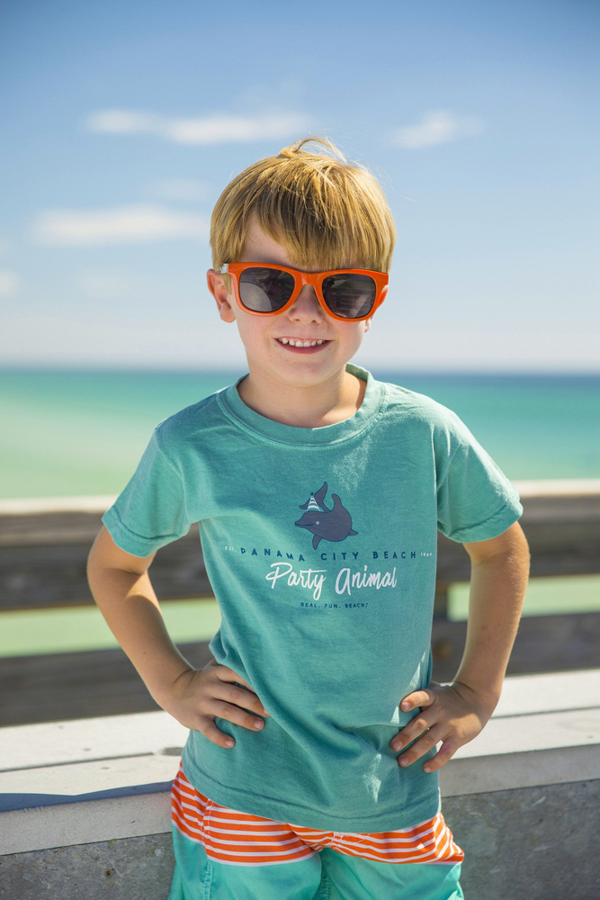 young boy wearing the panama city beach party animal shirt